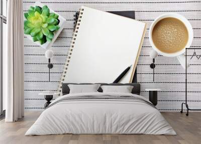 Still life, business, office supplies or education concept : Top view or flat lay image of open notebook with blank pages and coffee cup on table background, ready for adding or mock up Wall mural