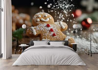 A cheerful gingerbread man decorated with icing and candy buttons, captured with a snowy effect of powdered sugar, symbolizing festive holiday spirit. Wall mural