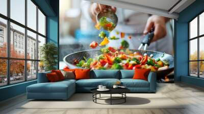 A chef creating a vibrant vegetable stir-fry in a pan, with colorful ingredients flying in the air, capturing a dynamic moment filled with energy, flavor, and excitement. Wall mural