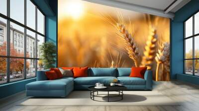 A glowing closeup of golden wheat stalks bathed in the warm light of sunset, signifying the abundance and purity of nature's harvest and the beauty of rural landscapes. Wall mural