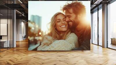 A joyful couple embraces warmly amid a city street during golden hour, radiating happiness and love, their casual attire reflecting a relaxed urban lifestyle. Wall mural