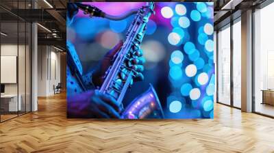 A musician in a white and red polka dot shirt passionately plays a saxophone under a vibrant display of colorful bokeh lights, capturing the essence of a lively performance. Wall mural