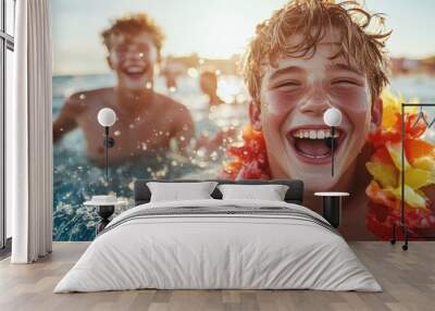 Joyful teens with colorful leis enjoy swimming in the ocean as sunlight reflects off their happy faces, capturing a moment of carefree summer fun and friendship. Wall mural