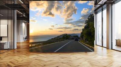 Beautiful coastal road at sunset Wall mural