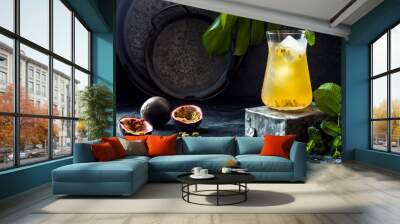 Passionfruit iced green tea or lemonade with lime and mint. Tropical refreshing cold drink for summer Wall mural