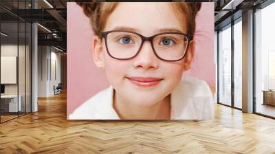 Cute little girl child preteen in eyeglasses education, school and vision concept isolated Wall mural