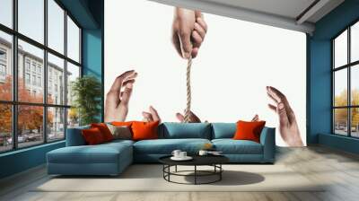 Human hand throws the rope to other people. Concept of salvation. Image. Wall mural