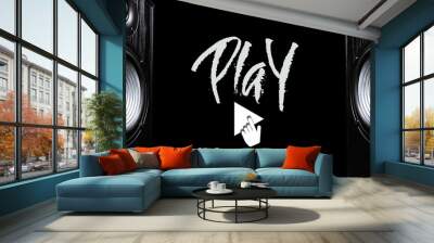 Two sound speakers with hand-drawn word PLAY between them on black background. Wall mural