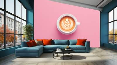 white cup with coffee art on pink background Wall mural