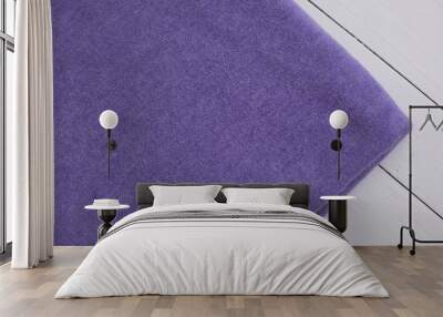 background texture. purple color knitted fabric on white background Wall mural