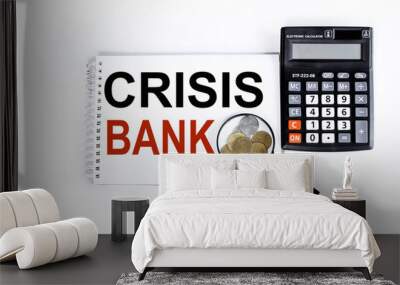 crisis bank, text on white paper on white background near calculator. Business fall concept. Wall mural