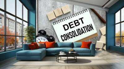 debt consolidation text on white paper. near the table clock. Wall mural