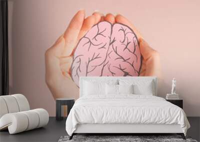 Hands holding paper brain..World Health Day. Global Health. Alzheimer disease, Pancreatic cancer, Epilepsy awareness, domestic violence awareness, world cancer day . Wall mural