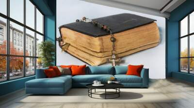 Black tattered Bible and Holy Rosary. The concept of Christian faith Wall mural