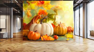 Festive autumn decor from pumpkins, berries and leaves. Concept of Thanksgiving day or Halloween with copy space Wall mural