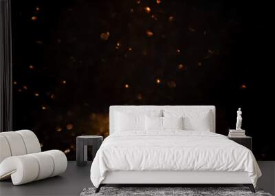 Warm golden bokeh lights illuminate a dark backdrop, creating an abstract pattern of soft glowing orbs ideal for backgrounds. Blurred shine bokeh for overlay effect. Wall mural