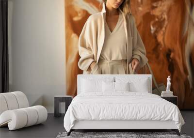 Young woman wearing soft beige clothing with tote bag in style of New-Age Minimalism or Quiet Luxury style Wall mural