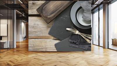 Grey kitchen utensils on rough distressed wooden table Wall mural