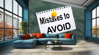 Mistakes To Avoid. green board with chalk footprint, top view. the paper is attached with a button to the board. with place for text Conceptual image of educational backgrounds. Wall mural