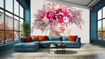 Abstract art collage of young woman with flowers Wall mural