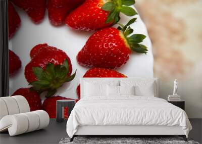 Red strawberries on the white plate at the beige background. Wallpaper, backdrop and postcard. Wall mural