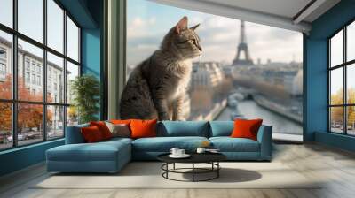 The cat sits on the windowsill and looks at Paris. Wall mural