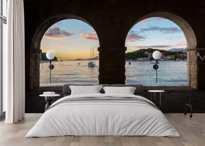 Sea view through two arches of the gallery. Cavtat, Dubrovnik, Croatia. Wall mural