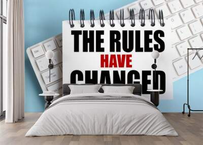 The Rules Have Changed. time to restart. text on white notepad paper on white keyboard Wall mural