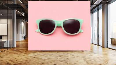 Mint sunglasses isolated on pink background. Closeup. Square image. Wall mural