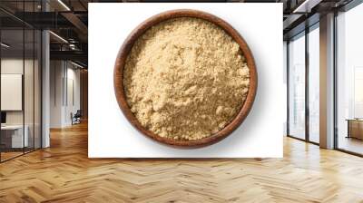 Sesame flour in wooden bowl on white background. View from above. Wall mural