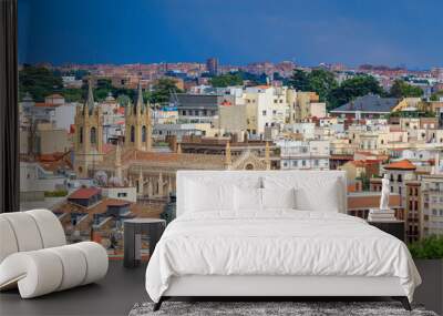 Aerial view of Madrid cityscape with Ritz hotel and San Jeronimo el Real Roman Catholic church rooftops in Madrid, Spain Wall mural