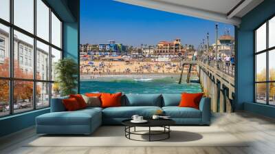 View of the pier, ocean and beach in surf city Huntington Beach, famous tourist destination in California Wall mural