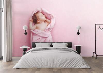 Newborn baby girl sleep on pink blanke Wall mural