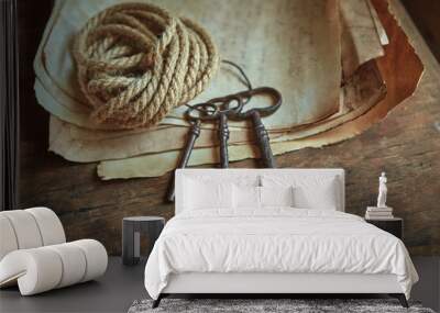 Rope, keys and a manuscript. Preparation of equipment for the discoverer, traveler. Wall mural