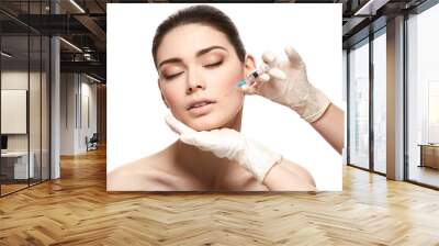 girl getting face injection isolated on white Wall mural