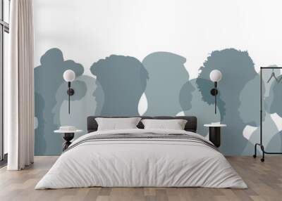 Silhouettes of people of different nationalities standing side by side.Silhouettes of a group of people.Vector illustration. Wall mural