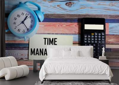 Text TIME MANAGEMENT, inscription on a notepad with a clock. Time management concept. Wall mural