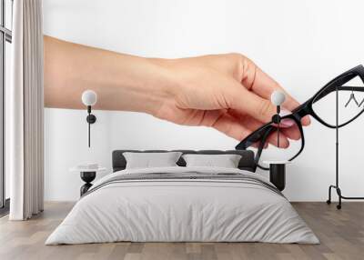 Hand with black eyeglasses, eye optic correction tool. Wall mural