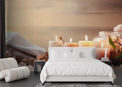 Beautiful spa treatment composition such as Towels, candles, essential oils, Massage Stones on light wooden background. blur living room, natural creams and moisturising Healthy lifestyle Wall mural