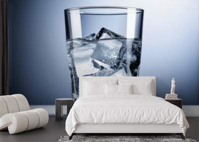 Close-up of a glass of soda water on a white background, isolate Wall mural