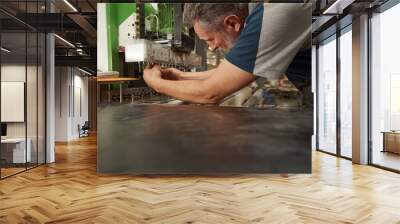 Close up of senior master working in joinery Wall mural