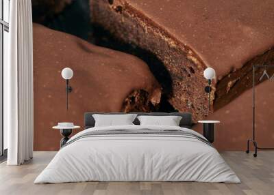 Cropped close up of sweet chocolate cake pieces Wall mural