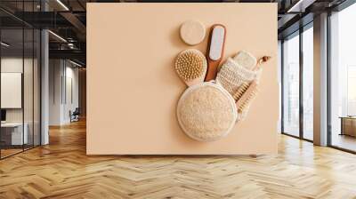 Flat lay composition with zero waste eco friendly cosmetics and bathroom accessories on beige background. Skin care concept. Face care routine. Hard soap and peeling accesories Wall mural