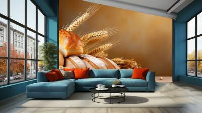 Food banner with natural breads. Fresh loafs of bread with ears of rye and wheat on a beige background with copy space. Crunchy french baguettes, slices of bread and a bun. Wall mural