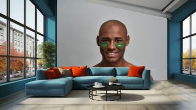 Man with self-assured smile in under eye patches Wall mural