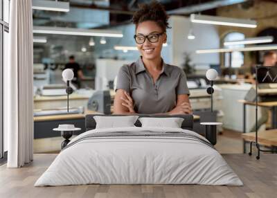 No hard work - no growth. Attractive african american worker posing in office Wall mural