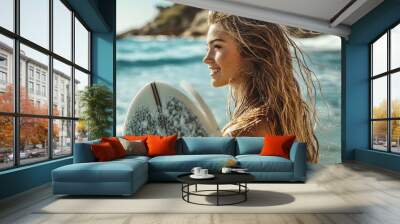 Side view of woman about to shower outdoors after surfing next to a surfboard Wall mural