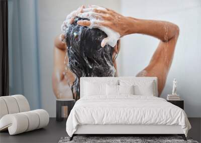 Young woman washing her hair in shower Wall mural