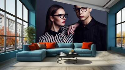 Eyewear concept. Portrait of gorgeous fashion couple in black cl Wall mural