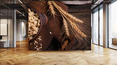 Bowl of cooked peeled barley grains porridge Wall mural